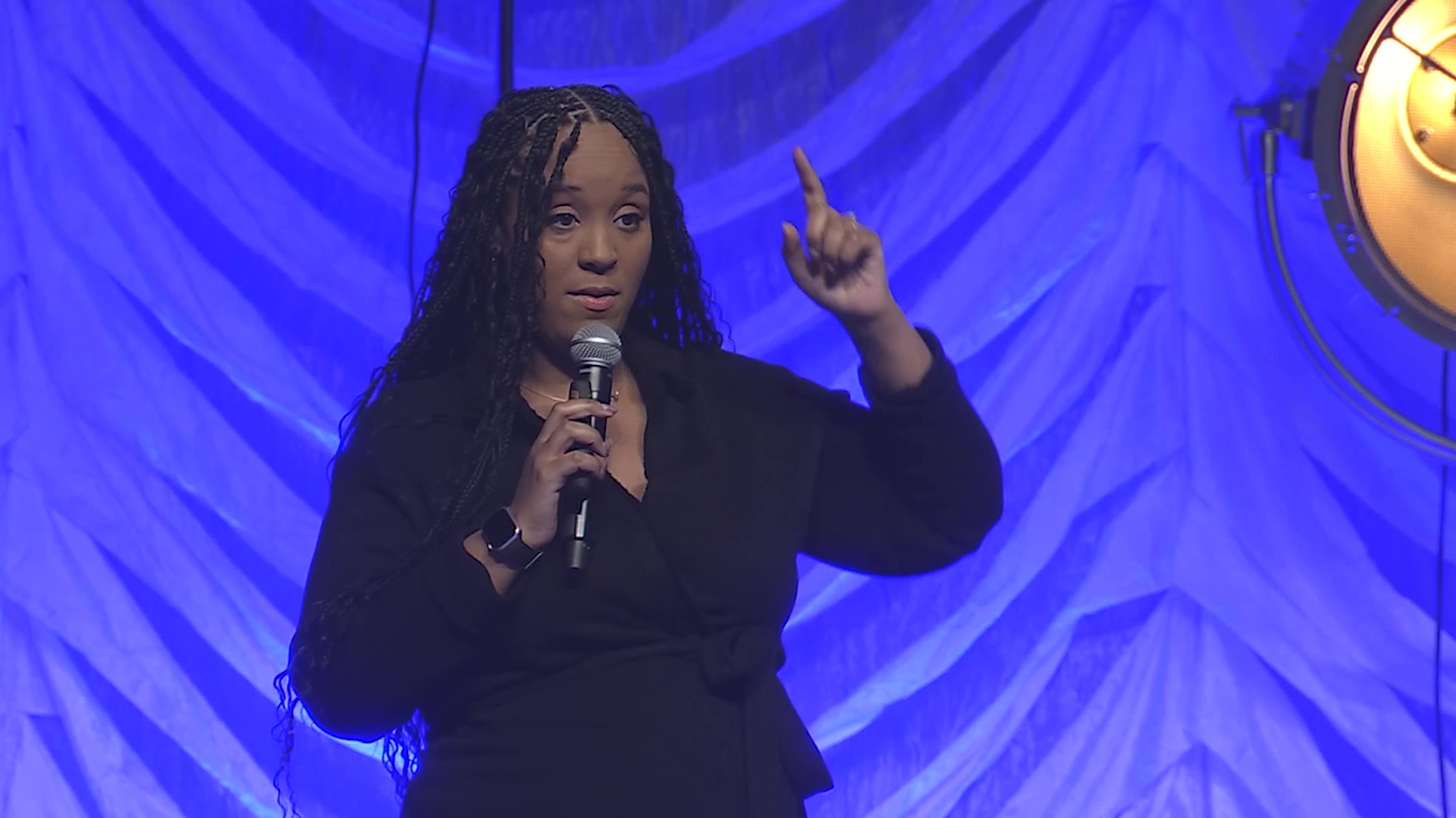 Erin Reddick speaking on stage
