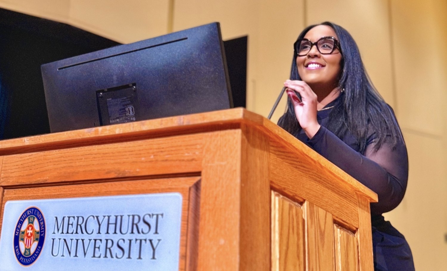 Erin Reddick speaking at Mercyhurst University